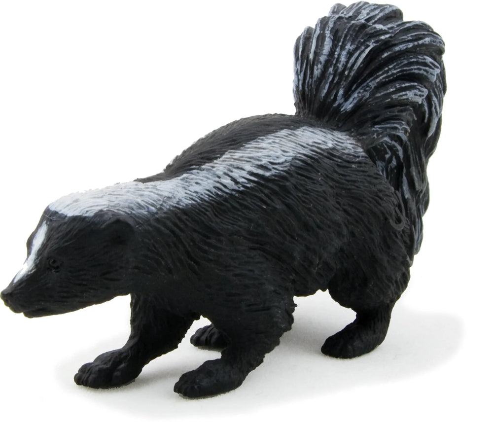 Stinkdyr legetøjsfigur 7x2x3,6 cm, alderssvarende 3+ — Mojo